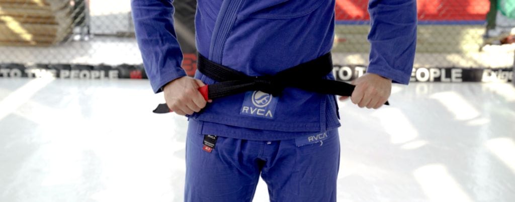 a martial art belt is being held